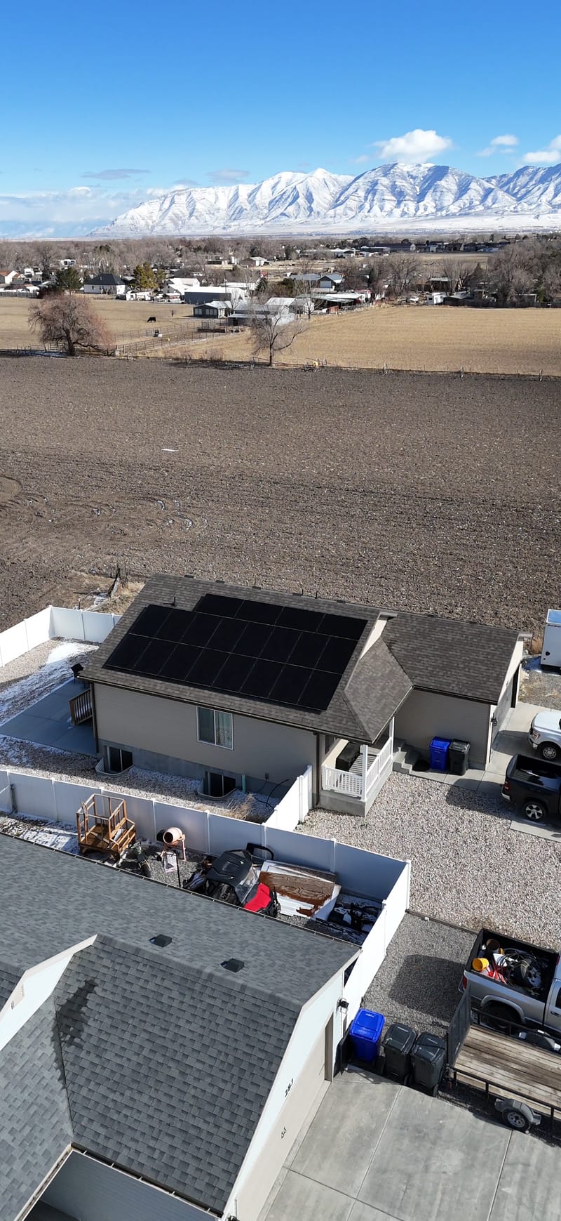 [Trina panels] Drone photo of 8.2kW system with mountain backdrop